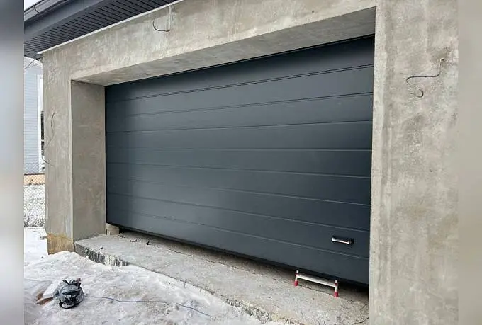 Секционные подъемные ворота для гаража